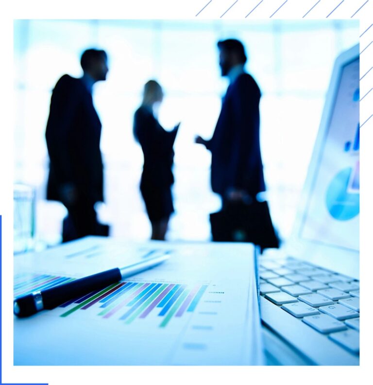 Business professionals reviewing data analytics